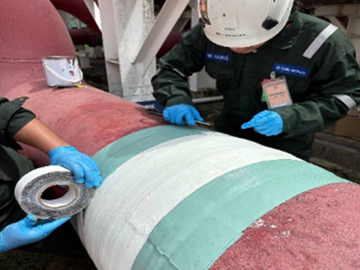 Corrosion protection wrap applied to a pipe section